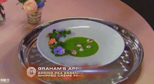 graham 's apple spring pea essence whipped creme fraiche on a plate