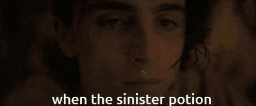 a close up of a person 's face with the words " when the sinister potion " below