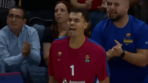 a man wearing a jersey with the number 1 on it is screaming