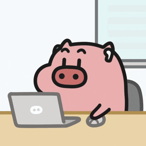 a cartoon pig sits at a desk using a laptop computer