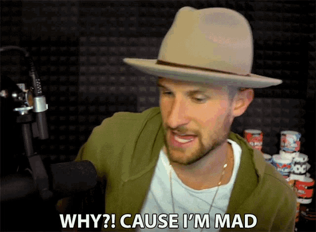 a man in a hat says " why ? cause i 'm mad "