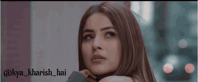 a close up of a woman 's face with the hashtag @kya_kharish_hai