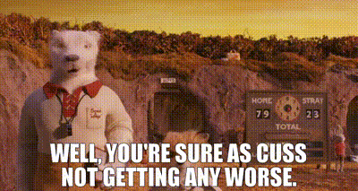 a polar bear is standing in front of a scoreboard and says well you 're sure as cuss not getting any worse