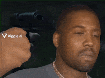 a person is pointing a gun at a man 's face with a viggle.ai logo on the bottom right