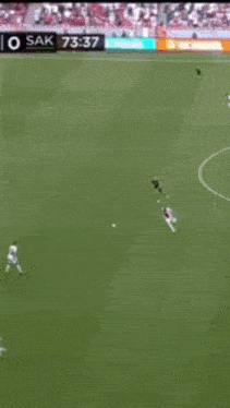 a soccer game is being played and the time is 7:47