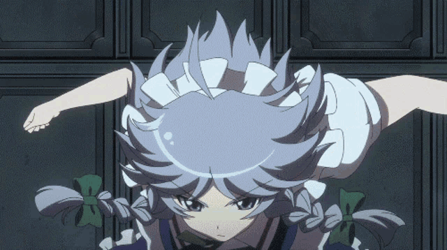 a girl with gray hair and braids is standing in front of a black wall