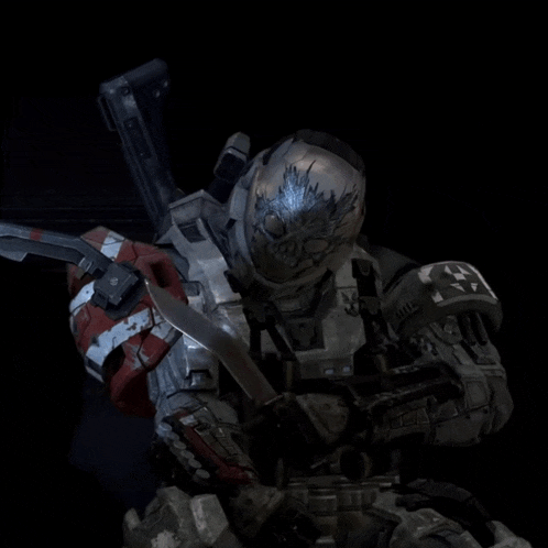 a soldier with a skull on his helmet holds a knife