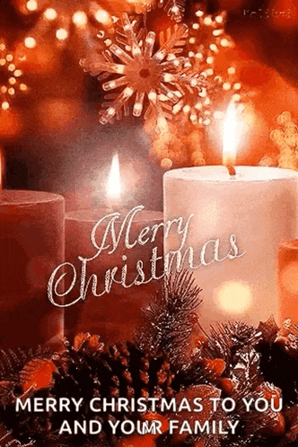 a merry christmas to you and your family greeting card with two lit candles .