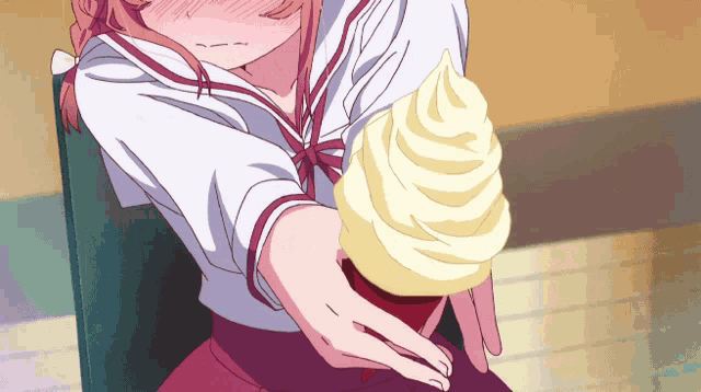 a girl in a school uniform is holding a cone of ice cream in her hand