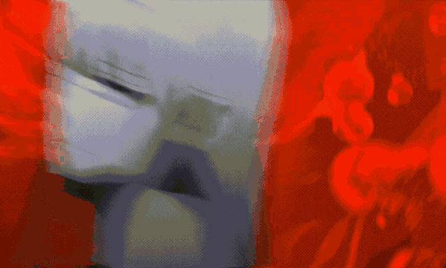 a pixelated image of a person 's face against a red background