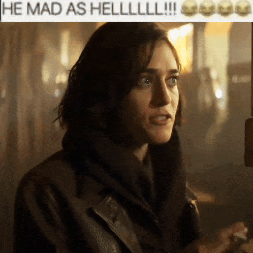 a woman in a leather jacket with the words he mad as hell on the top