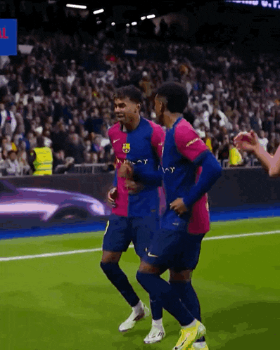 a soccer player wearing a jersey that says ' barca ' on the front