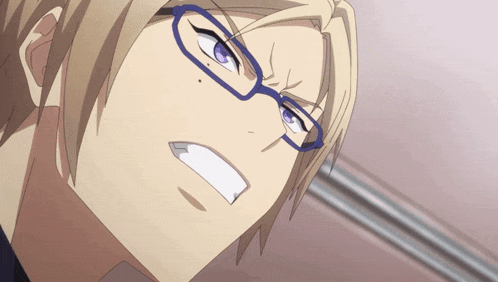 a close up of a person 's face with glasses