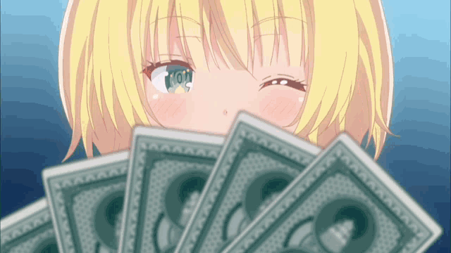 a girl with blonde hair is holding a fan of money in front of her face