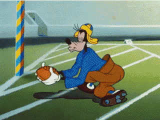 a cartoon of goofy catching a football with the letter c on his pants