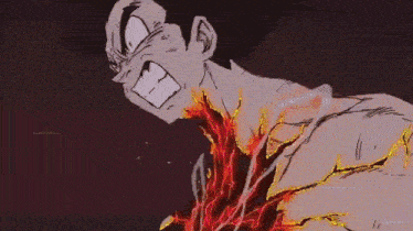 a close up of a yellow flame coming out of a hole in the ground .