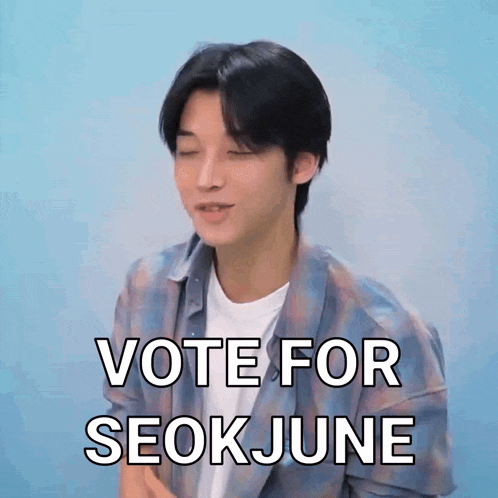 a man in a plaid shirt is making a funny face and saying vote for seokjune