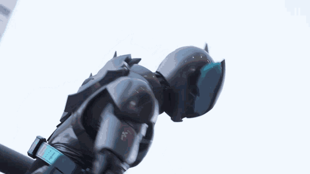 a robot with a helmet that looks like a sword