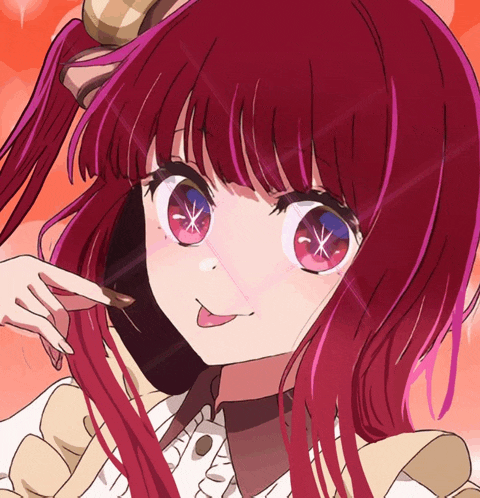a close up of a girl with red hair and blue eyes making a funny face