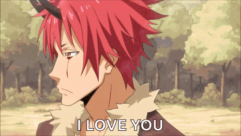 a man with red hair and horns is saying i love you .