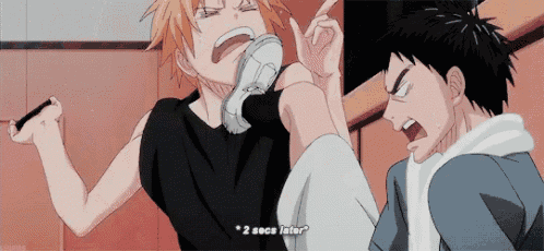 a couple of anime characters are standing next to each other and one of them is screaming .