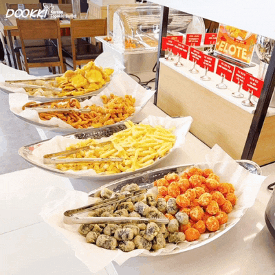 a buffet with a sign that says ' dokki ' on it