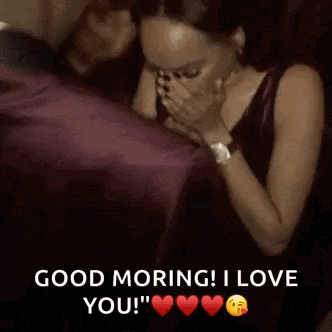 a woman is covering her face while a man holds a ring in his hand and says good morning i love you .