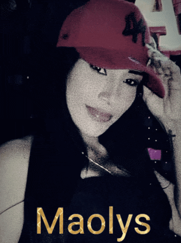 a woman wearing a red hat with the letter a on it is named maolys