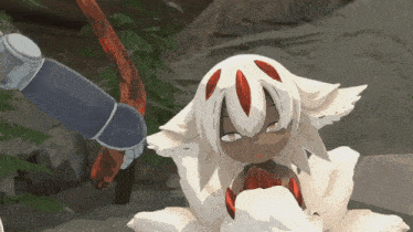 a cartoon character with white hair and red eyes is standing next to a person holding a sword .