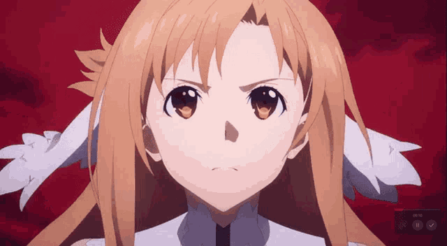 a close up of a girl 's face with a red background and a pause button