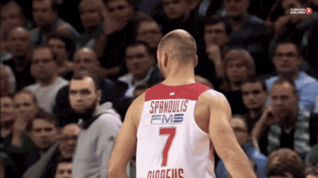 a man in a red and white jersey with the number 7 on it