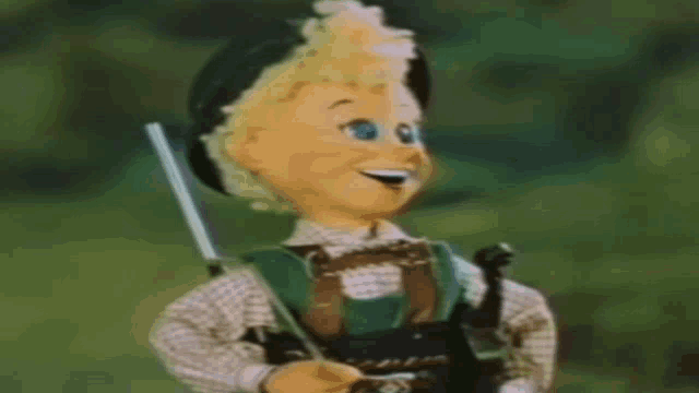 a cartoon character is holding a rifle and smiling .