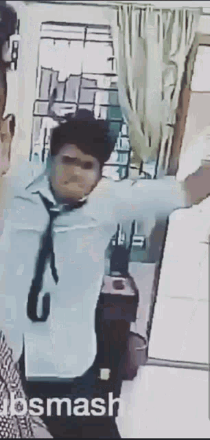 a man in a white shirt and tie is standing in front of a window with his arms outstretched