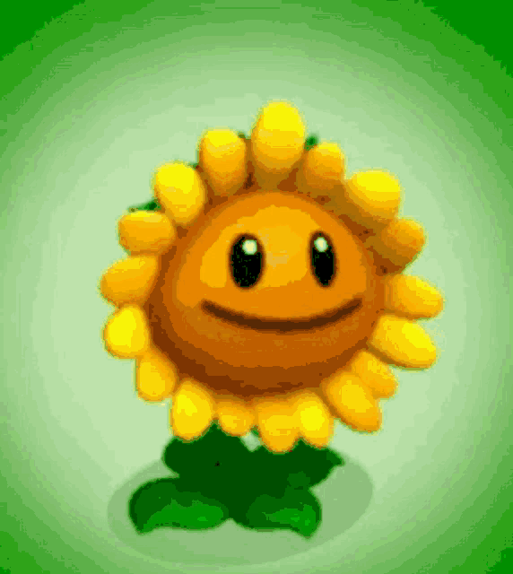 a cartoon sunflower with a smiling face is standing on a green background .