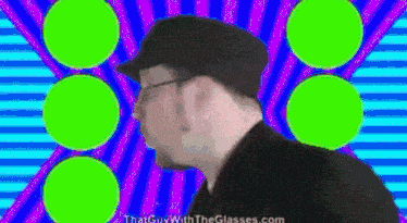 a man wearing glasses and a hat is standing in front of a colorful background with green circles .