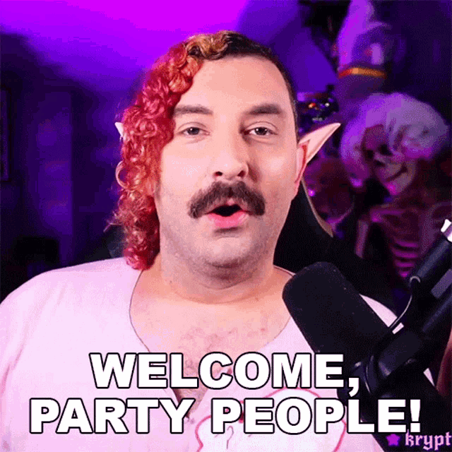a man with red hair and a mustache says " welcome party people "
