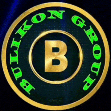 a gold circle with the letter b in the middle