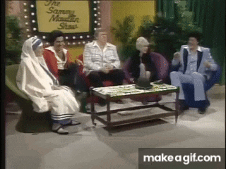 a group of people sitting in front of a sign that says the sammy mandarin show