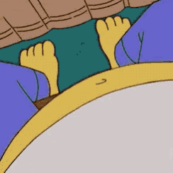 a close up of a cartoon character 's feet with a arrow pointing to the right