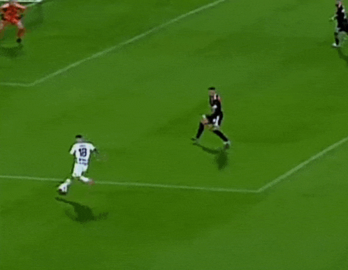 a soccer game is being played on a field with a sign that says libra
