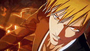 a close up of a man with yellow hair and orange eyes