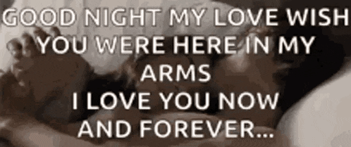 a couple laying in bed with a message that says `` good night my love wish you were here in my arms ''