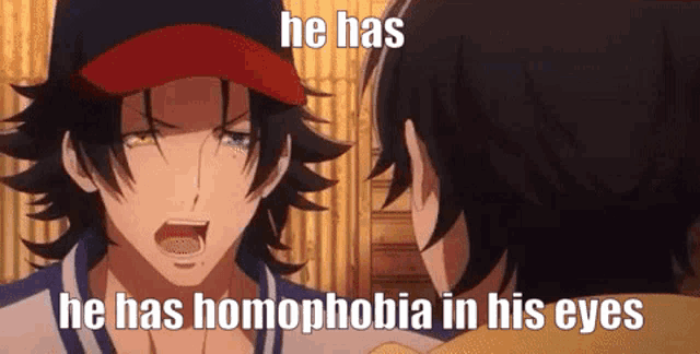 a man in a baseball cap is talking to another man in a cartoon .
