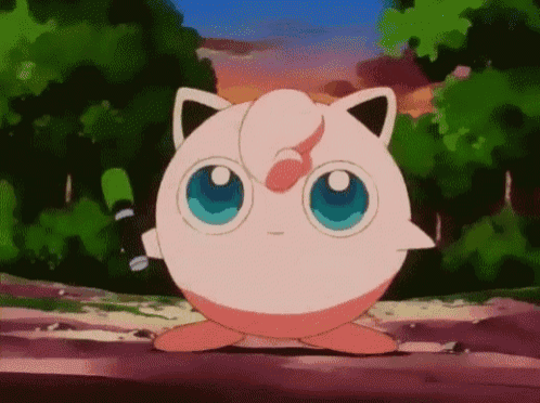 jigglypuff from pokemon is standing on a dirt road in a forest .