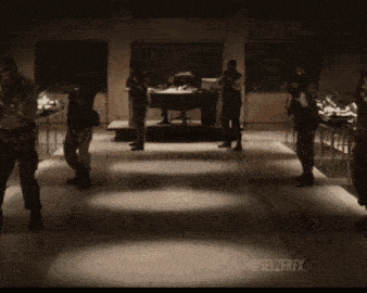 a group of people standing in a dark room with a seltzerfx logo on the bottom right