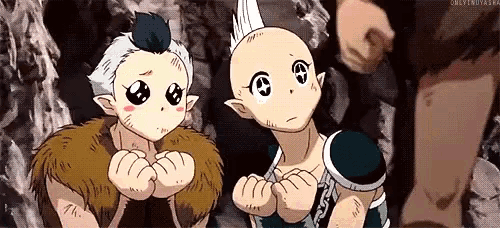 two anime characters are standing next to each other and one has a mohawk on his head .