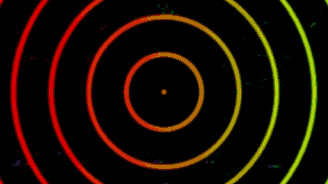 a colorful swirl with a pink eye in the middle