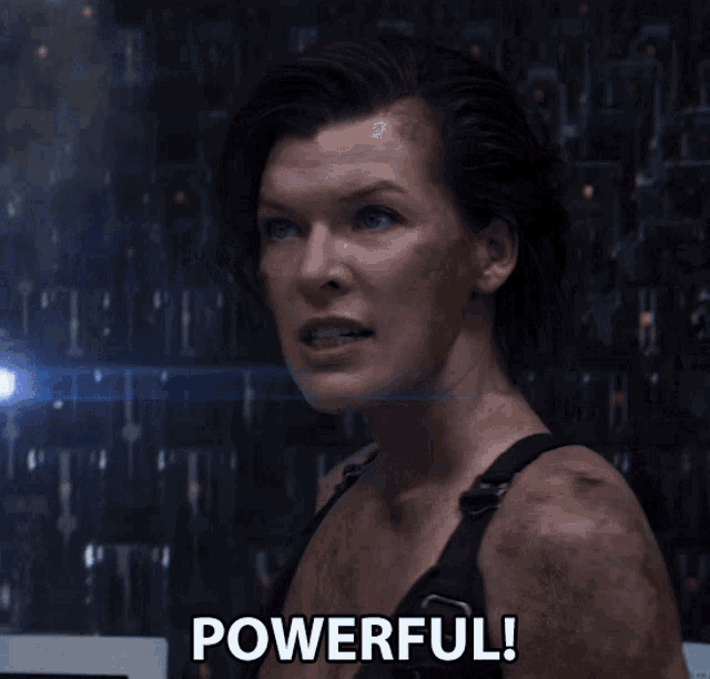 a woman says powerful in front of a bunch of computers