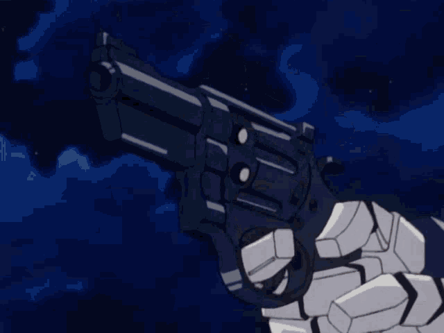 a robotic hand is holding a gun that is pointed at something