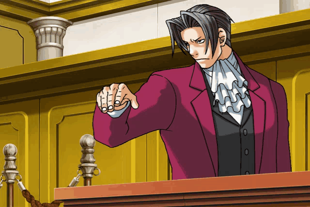 a man in a red suit is giving a thumbs up sign